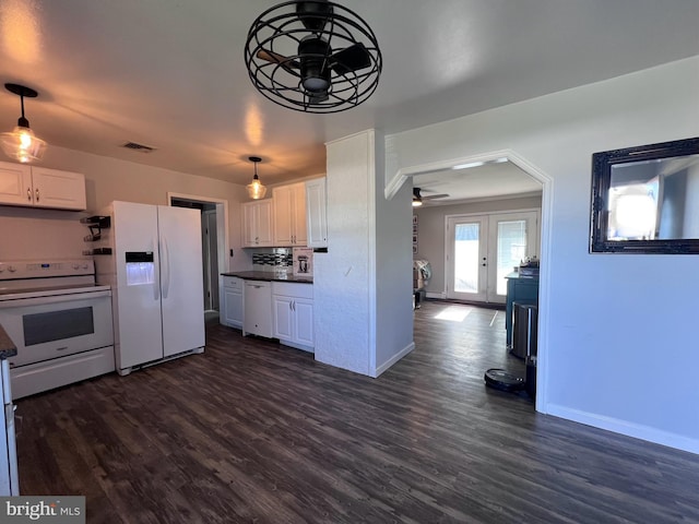 kitchen with white appliances, dark wood-type flooring, ceiling fan, white cabinets, and french doors