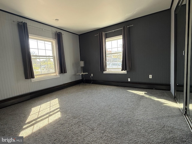 unfurnished room featuring carpet flooring