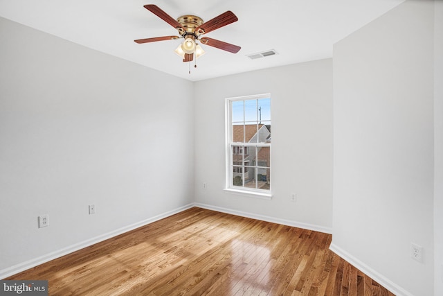 unfurnished room with ceiling fan and light hardwood / wood-style flooring