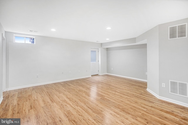 basement featuring light hardwood / wood-style floors