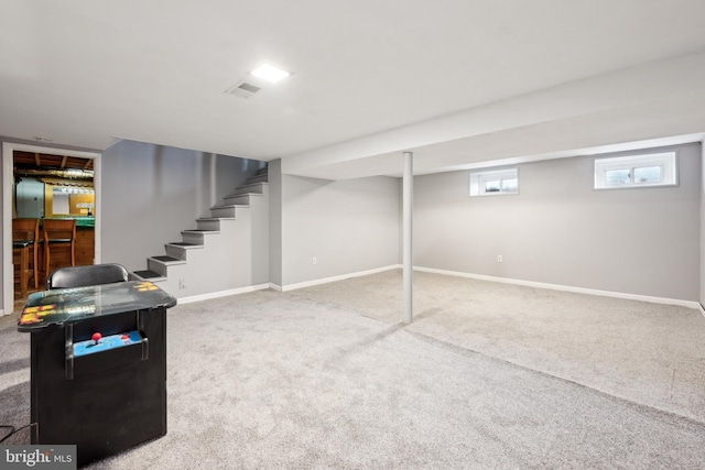 basement featuring carpet floors