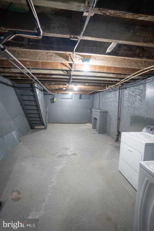 basement featuring washing machine and dryer