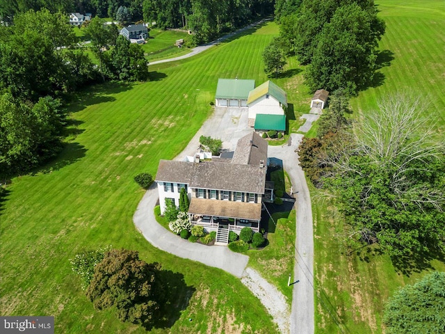 birds eye view of property featuring a rural view