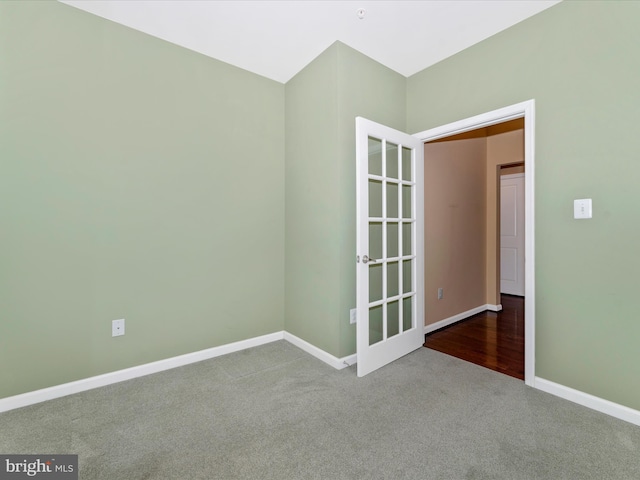 empty room with carpet flooring