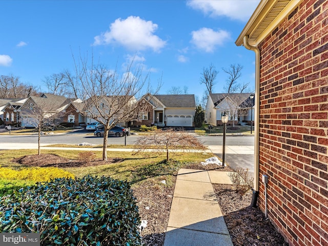 view of yard featuring a garage