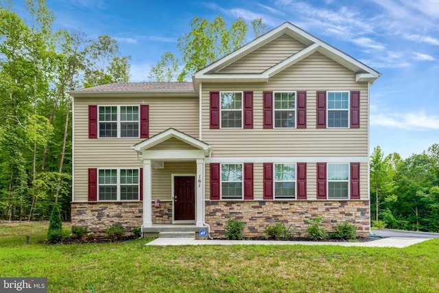 view of front of property with a front lawn