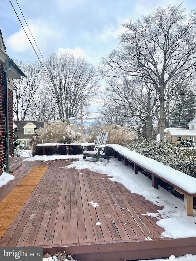 view of snow covered deck