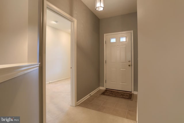 view of tiled foyer entrance