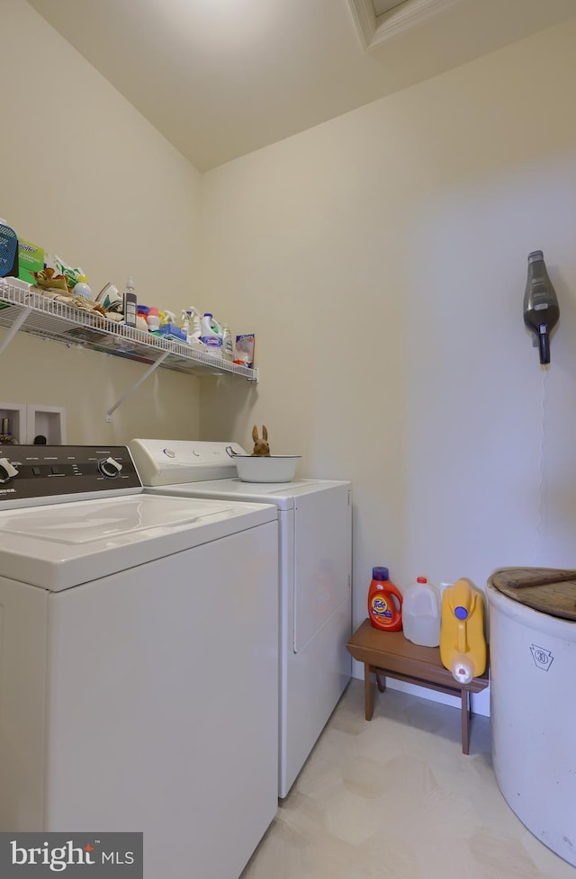 washroom with separate washer and dryer