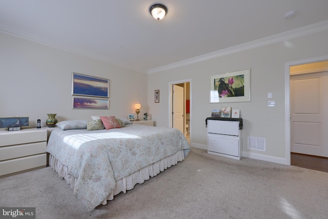 carpeted bedroom featuring ornamental molding