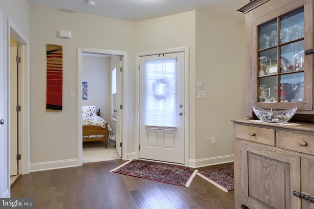 foyer featuring dark hardwood / wood-style floors