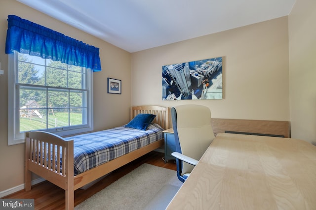 bedroom featuring hardwood / wood-style flooring