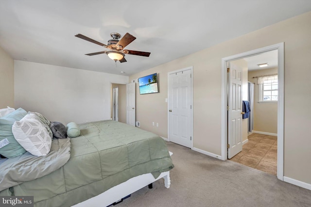 carpeted bedroom with ceiling fan