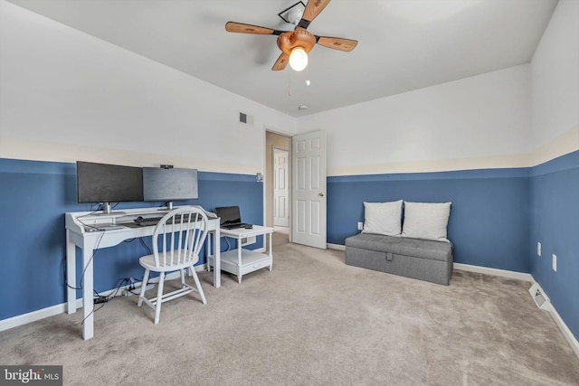 home office featuring ceiling fan and carpet