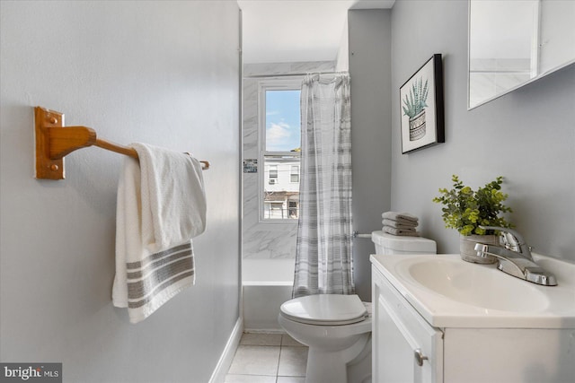 full bathroom with tile patterned floors, vanity, toilet, and shower / bath combo with shower curtain