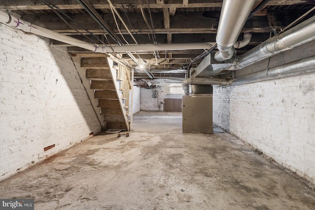 basement featuring heating unit