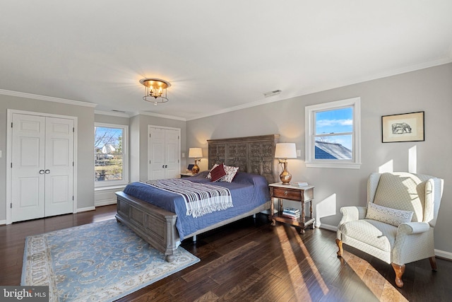 bedroom featuring crown molding and dark hardwood / wood-style flooring