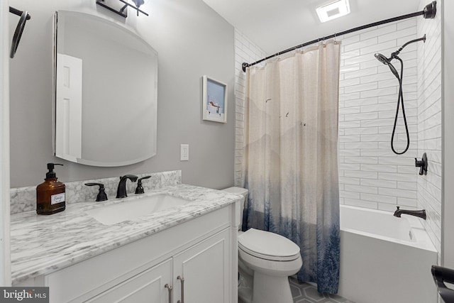 full bathroom with vanity, toilet, and shower / bath combo with shower curtain