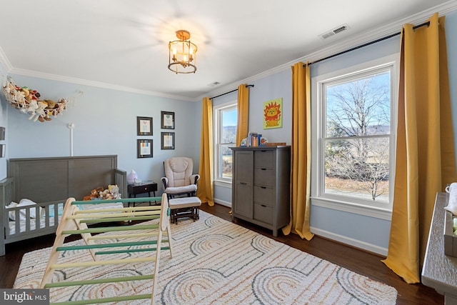 bedroom featuring ornamental molding and dark hardwood / wood-style floors