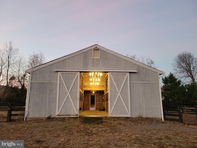 view of outdoor structure at dusk