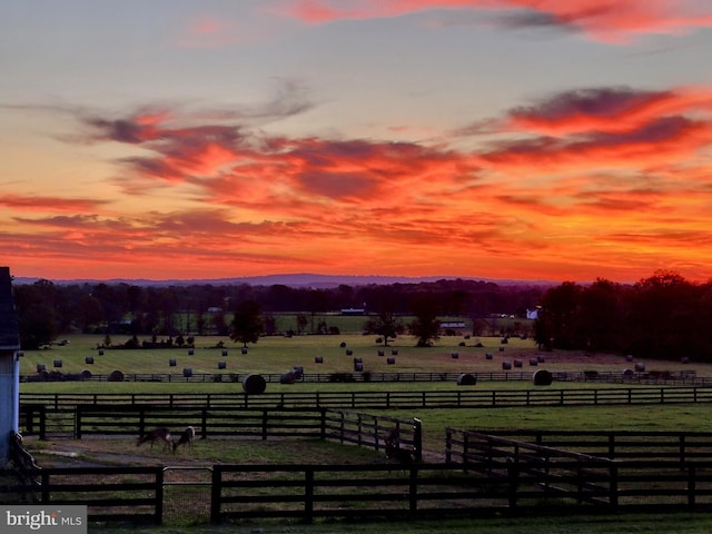 mountain view featuring a rural view