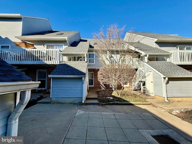 rear view of property with a patio area