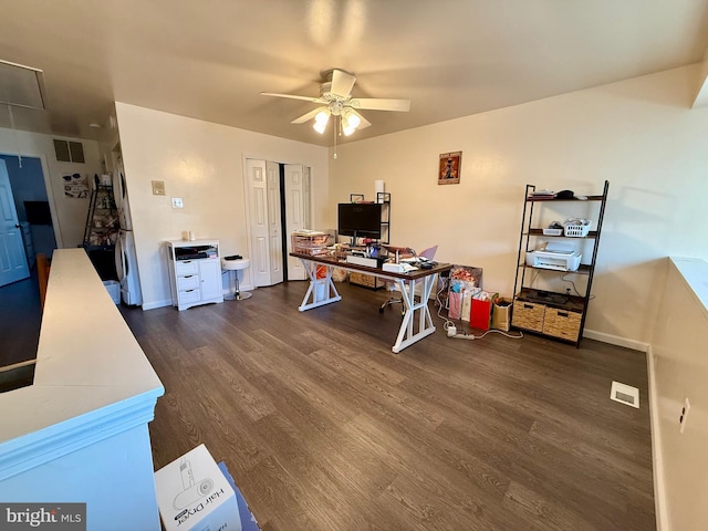 office area featuring dark hardwood / wood-style flooring and ceiling fan