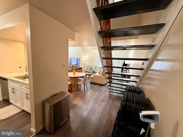 hallway with sink and dark hardwood / wood-style floors