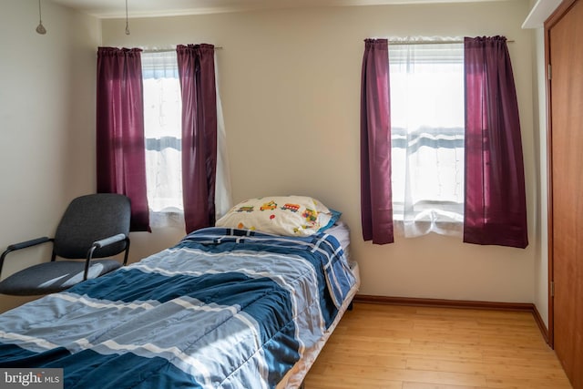 bedroom featuring light wood-type flooring