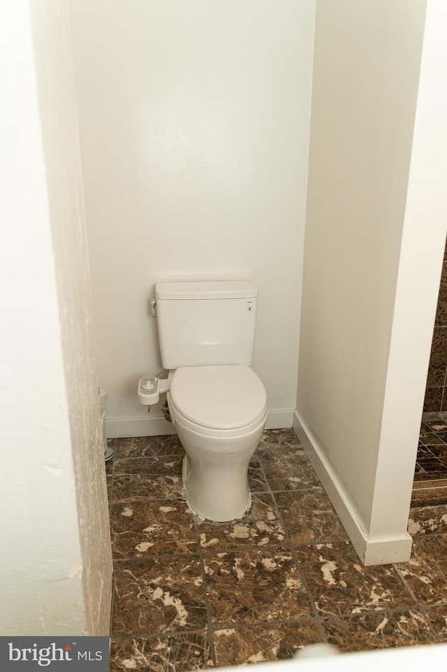 bathroom featuring toilet