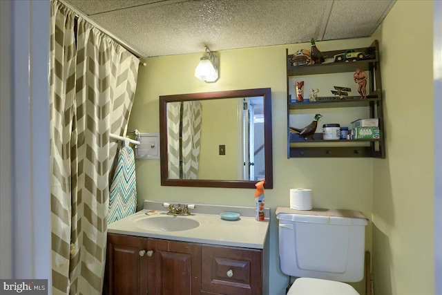 bathroom with vanity, toilet, and a shower with shower curtain