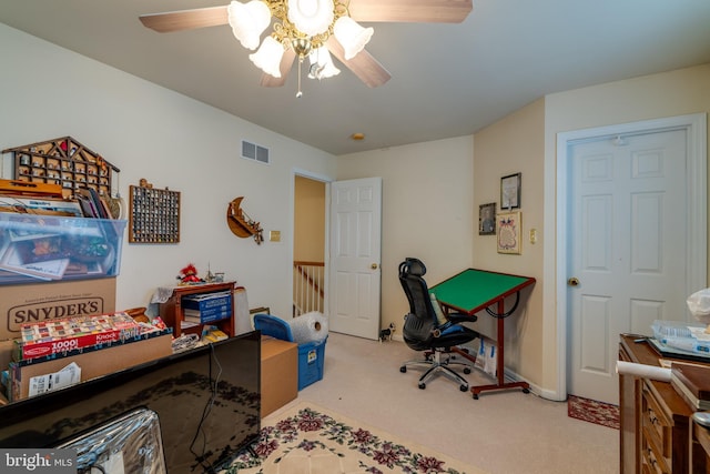 playroom featuring light colored carpet and ceiling fan