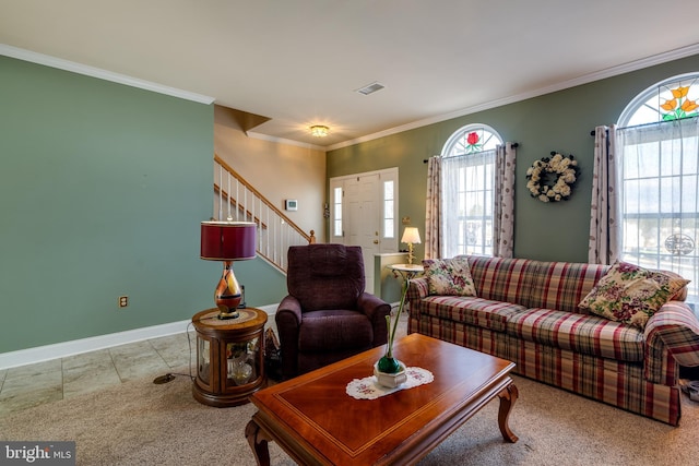 carpeted living room with ornamental molding