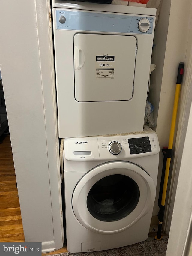 laundry room featuring stacked washer / dryer