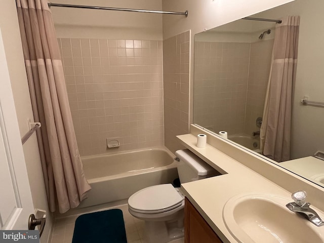 full bathroom featuring shower / bathtub combination with curtain, vanity, tile patterned floors, and toilet