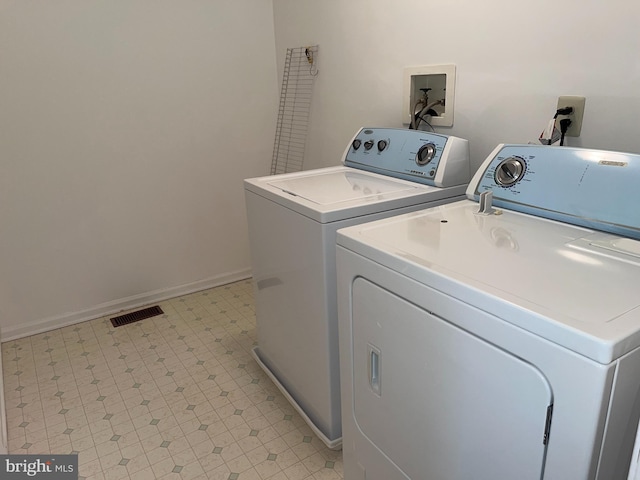 laundry area featuring washer and clothes dryer