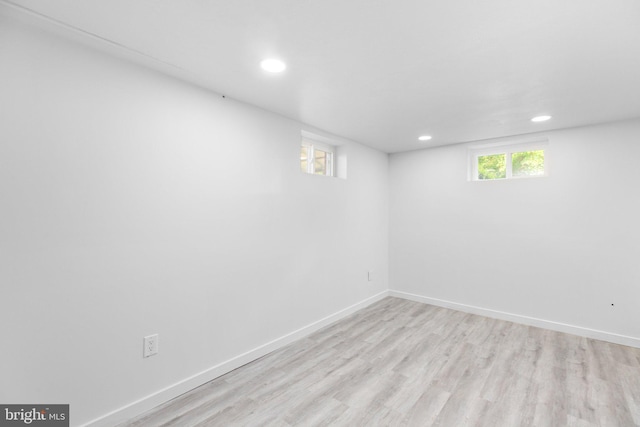 basement with light wood-type flooring