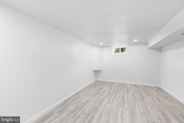 basement featuring light wood-type flooring