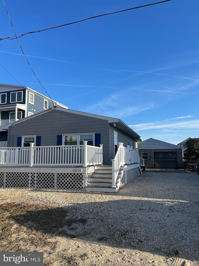 view of front of property featuring a carport