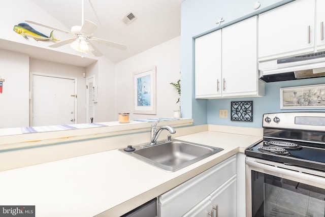 kitchen featuring white cabinets, sink, stainless steel range with electric cooktop, and ceiling fan