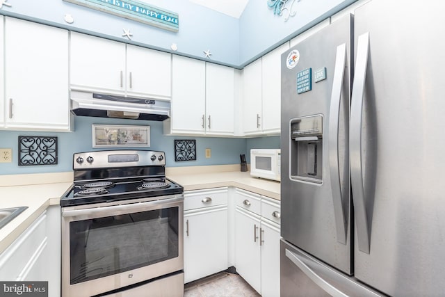 kitchen with white cabinets and appliances with stainless steel finishes