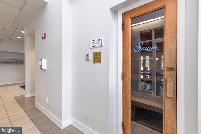 view of sauna / steam room with tile patterned floors