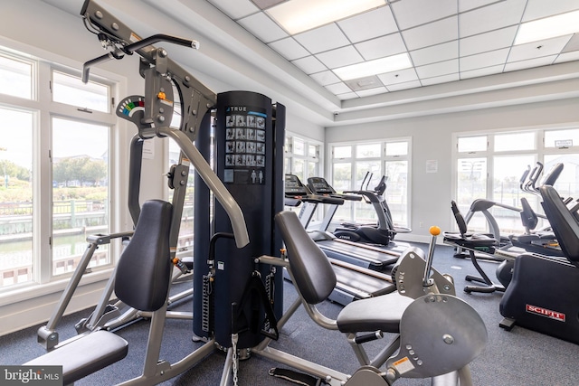 workout area with a drop ceiling