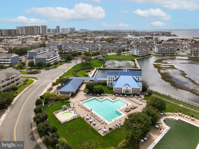 bird's eye view with a water view