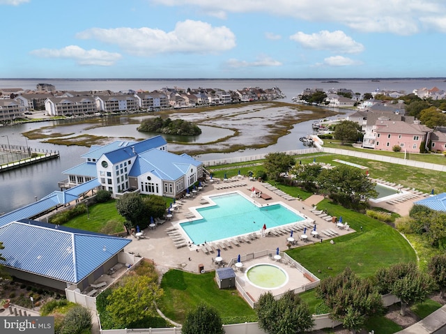 drone / aerial view with a water view