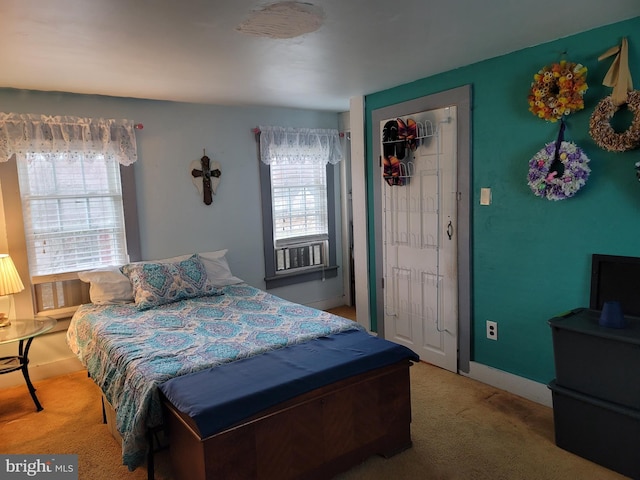 carpeted bedroom with a closet