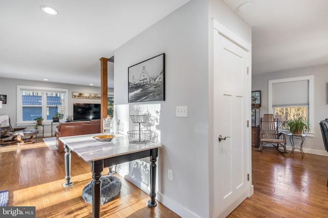 hallway featuring hardwood / wood-style flooring