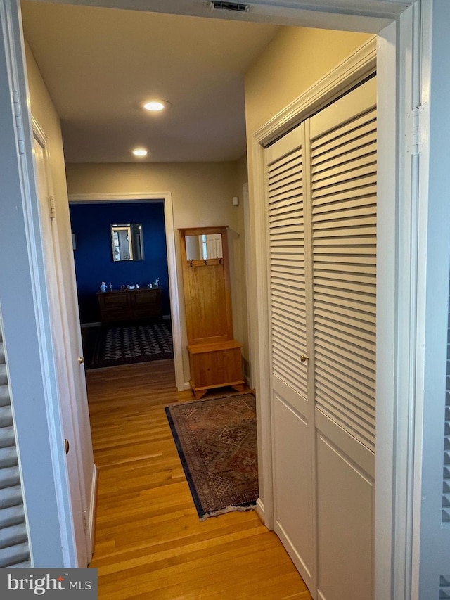 hall with light wood-type flooring