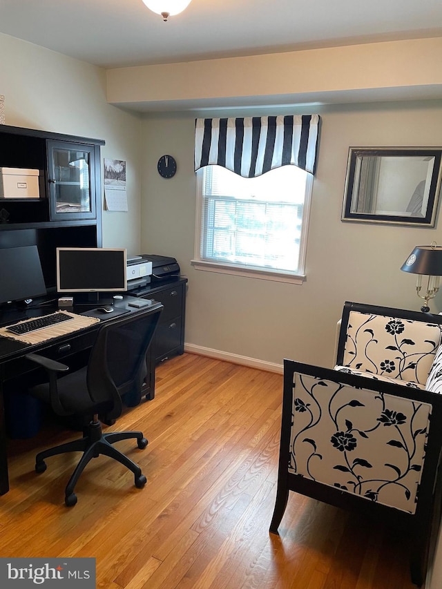 office space featuring light hardwood / wood-style floors