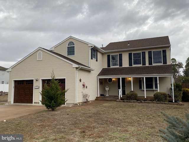 view of front of house featuring covered porch and a front lawn